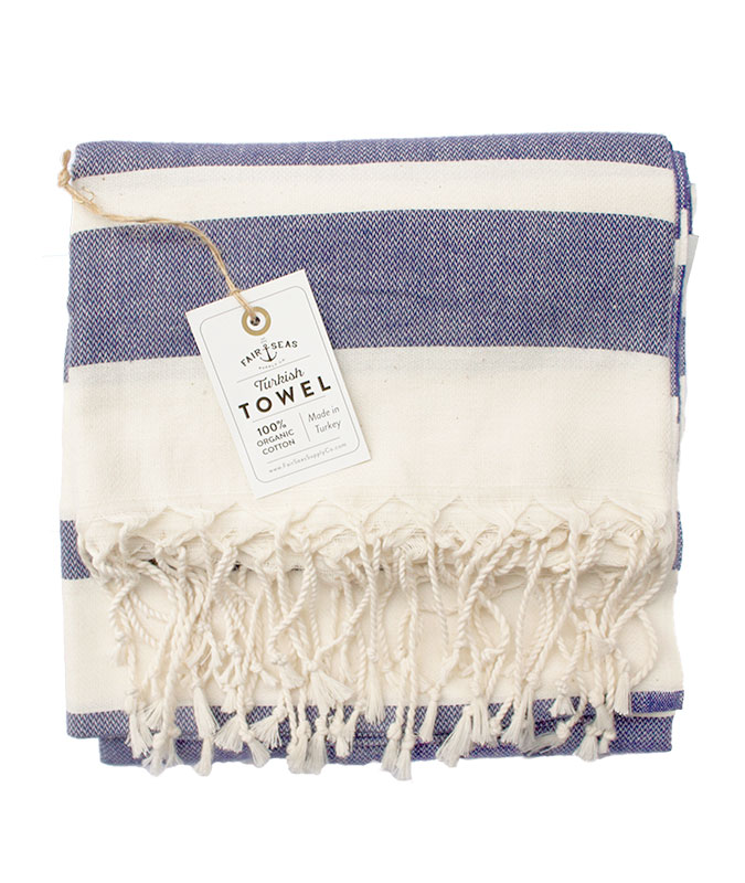 Photo of the Turkish Towel in Indigo Blue folded from Fair Seas Supply Co