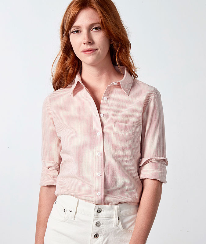 woman wearing the Brynn shirt in the peony stripe colorway