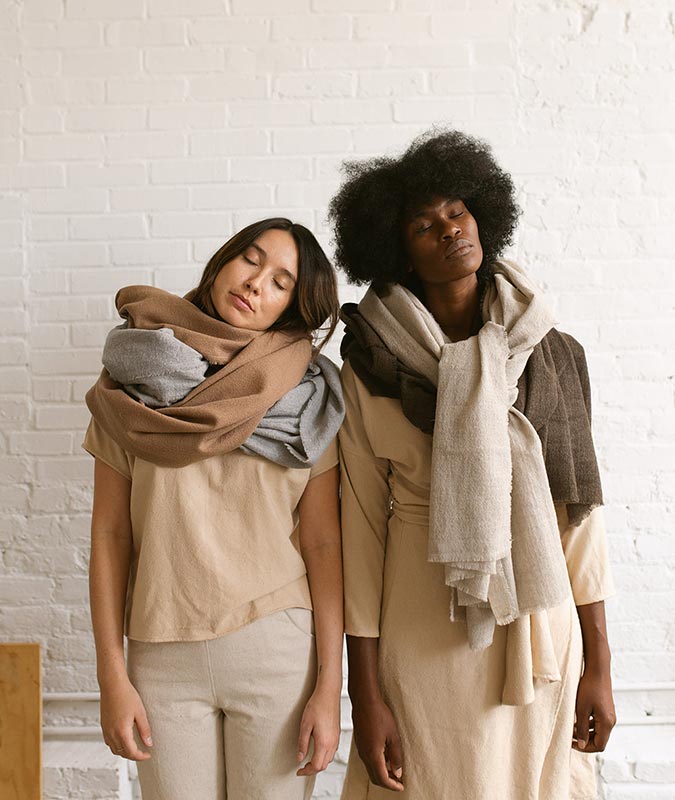 Two women wearing the frances scarf in multiple colors